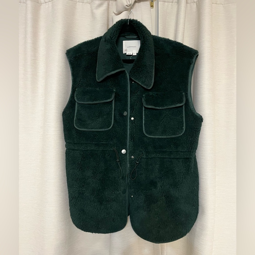 Anthropologie faux shearling vest in hunter green.